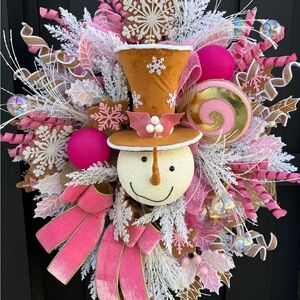Cheerful Snowman Holiday Wreath with Pink and Orange Accents